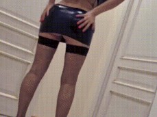 Curvy girl in  erotic outfit poses, walks with heels and slaps big ass gif