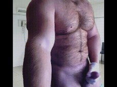 beefy muscle stud in latex gloves strokes his thick, hot cock 0519-1 gif