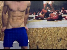 lean muscle hunk puts on wrestling suit 0010-1 gif