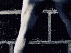 A man in shackles gif