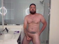 hot, handsome, beefy, bearded guy jerks off, looking into  01371 3 gif